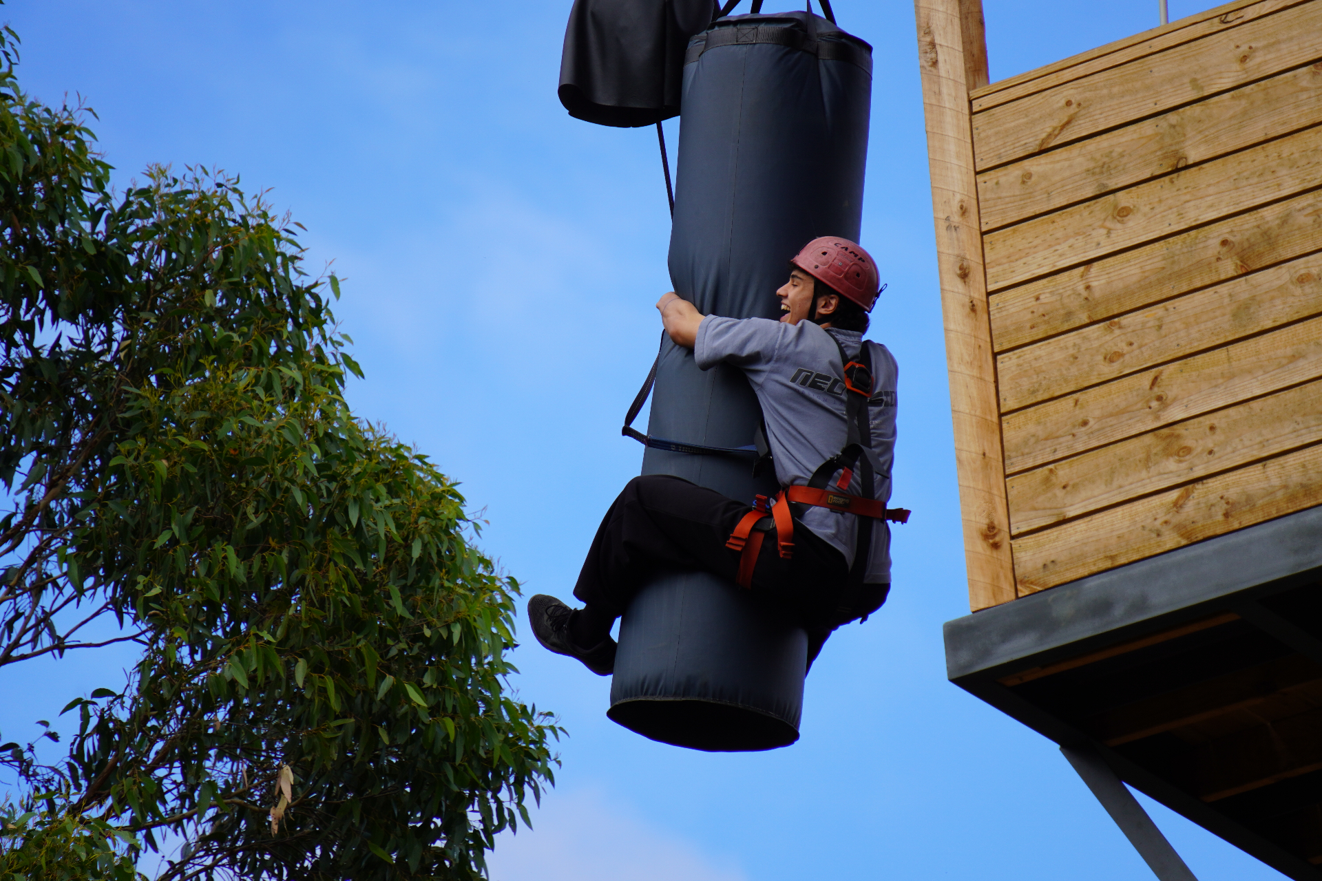 Students on the flying fox at The Summit adventure activities park
